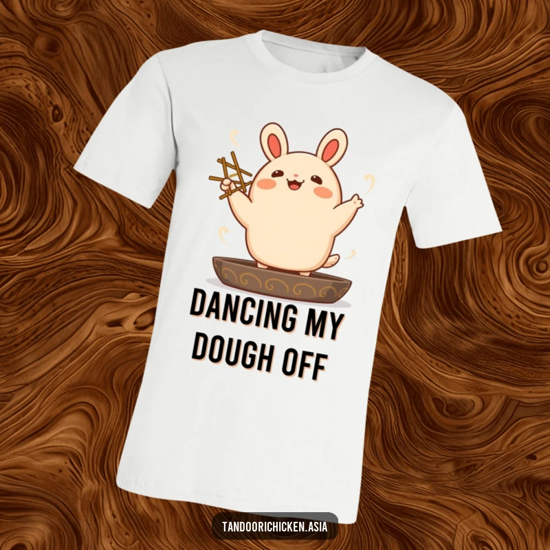 Funny kawaii bao bun character doing a joyful dance while holding chopsticks, printed on a trendy t-shirt.